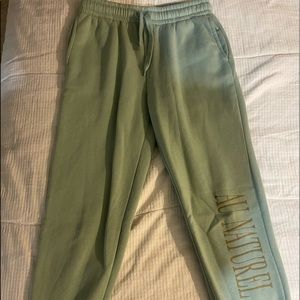 green sweat pants